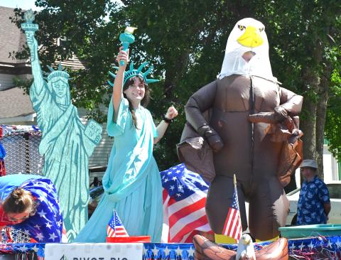 The annual parade at Waubay Fun Fest was another huge celebration for the community. Dozens of floats were driven down Main Street and candy filled the streets. Here, Brittany Hanna dressed up as the Statue of Liberty and Ryan Hanna showed off his American spirit by dressing up as an eagle. Pictures by Reporter &amp; Farmer |Connor Handrahan