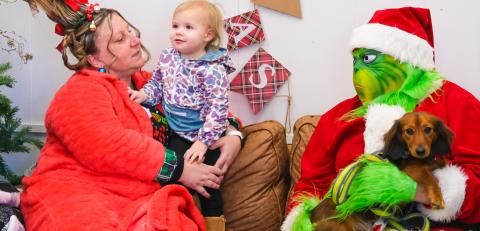 Piper Spears, age two, meets Cindy Lou Who played by Amanda Dohn, the Grinch, played by Tori Hoffer Dec. 13 at Brewhouse in Webster. The meet-and-greet was part of a fundraiser to cover medical expenses for a local child who experienced a medical trauma. Spears is the daughter of Megan and John Spears from Webster. Reporter &amp; Farmer | Leyton Beardslee