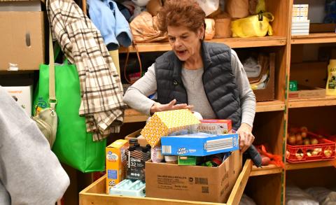 Bristol resident Joni Dolney loads up food for her neighbor at Day County Food Pantry Nov. 11 in Webster. Food pantry organizer Margaret Kwasniewski said the pantry has seen a slight increase in people served due to the government shutdown which resulted in a SNAP block. Reporter &amp; Farmer | Connor Handrahan