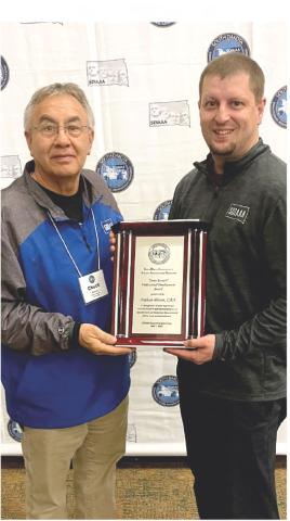 From left, Todd County AD Chuck Wilson, president of the SD Interscholastic Athletic Administrators Association presented the Steve Berseth professional development award to Webster Area School AD Nathan Bloom at SDIAAA's annual conference in Chamberlain. Reporter &amp; Farmer \\ Subscriber snapshot