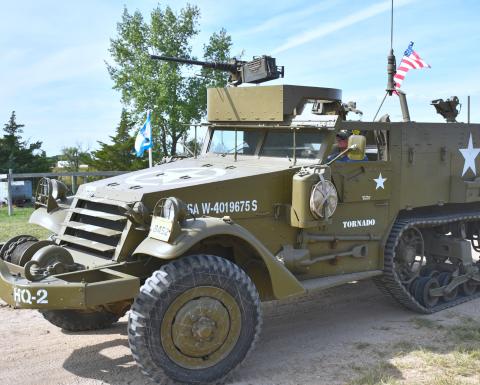 United States Marine Corps veteran Jimmie R. Nelson drives his 1943 M3 Half-Track Personnel Carrier as part of a special military equipment display to honor veterans in the Andover threshing show in Andover Sept. 12. Reporter &amp; Farmer | Timothy Gibson