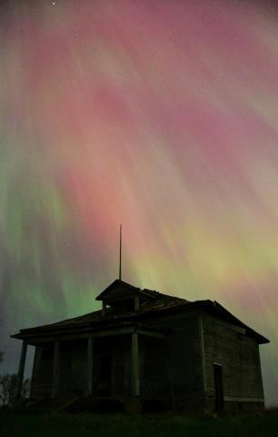 One of the biggest solar storms to hit earth in nearly two decades arrived last weekend, May 10-11 when the aurora borealis, commonly known as the northern lights, could be seen overhead Friday night into early Saturday morning. Here, the old Morton Township school house south of Webster stands in the foreground as colorful lights fill the sky behind. Reporter &amp; Farmer | Amanda Dulitz
