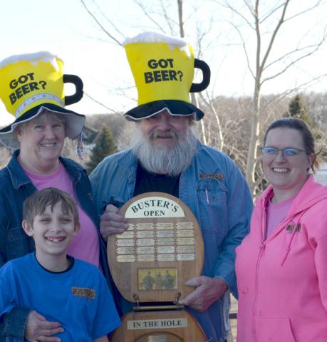 Reporter &amp; Farmer | Subscriber snapshot Peggy and Buster Sichmeller, in back, presented the “In the Toilet” award to Luke Sichmeller, left and Amber Olson, right who placed last.