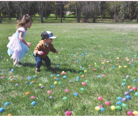 Chesney and Stone, son and daughter of Dani and James Pearson dash through a colorful spread of Easter eggs during the Easter Eggstravaganza hosted by First Baptist Church May 2. The event was postponed earlier in the year due to weather. Reporter &amp; Farmer | Jessica Washenberger