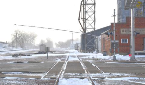 High winds bent over one of railroad crossing barricade along train tracks in Webster Dec. 18. Reporter &amp; Farmer | Leyton Beardslee