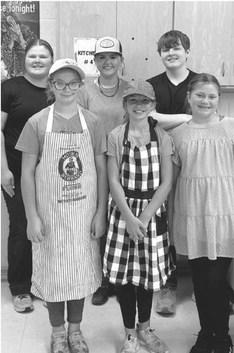 Reporter &amp; Farmer \\ Subscriber snapshot Day County 4-H Special Foods contest was June 17 at Webster Area School. Places were awarded to, from left, front, Raelee Ellingson, beg. reserve grand champion; Kallie Zirbel, beg. grand champion; Aliyah Zirbel, jr. reserve grand champion; back, Kelsey Fischer, sr. grand champion; Lola Wells, sr. reserve grand champion and Carson Fischer, jr. grand champion.