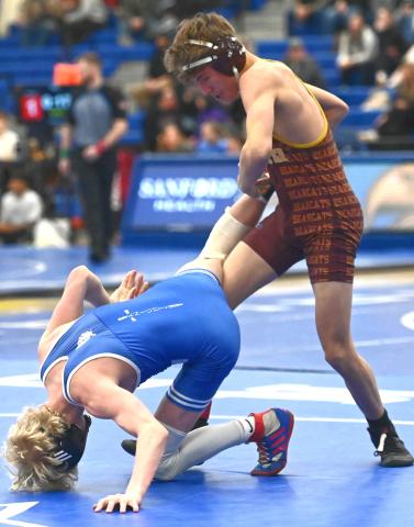 Tayten Kurkowski flips his opponent during the Lee Wolf Invitiational Jan. 31 in Aberdeen. Kurkowski placed seventh with a record of 2-2 and earned five team points. Reporter &amp; Farmer | Brianna Jorgenson, Captured Creations Photography