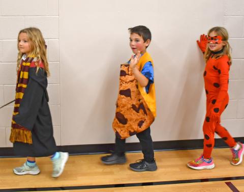 Ahead of trick-or-treating Oct. 31, Webster Area Elementary students held a parade to show off their Halloween costumes. Pictured here are students Anna Bloom, Tyler Acree and Naomi Acree. Reporter &amp; Farmer | Jessica Washenberger