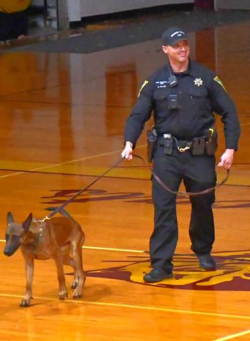 Brandon Miller a United States Marine Corps veteran gave a speech at Webster Area’s Veterans Day assembly at Webster Armory Nov. 11 joined by his South Dakota Highway Patrol K-9 dog named Lucky. Miller addressed students and community members about the importance of honoring veterans. Reporter &amp; Farmer | Connor Handrahan