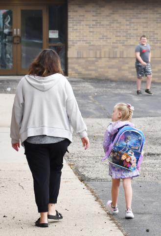 The first day of school for Webster Area School District started Aug. 20. Five-year-old Berkley Matthews walks to her first day of kindergarten at Webster Area Elementary School alongside her mother, Brandi Matthews. Reporter &amp; Farmer | Brenner Cariveau