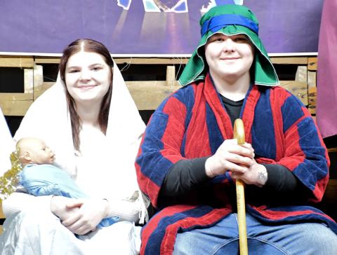 Bergen Church put on a live reenactment of the holy night Dec. 21. Left, LJ Mays portrays Mary and Sean Sichmeller portrays Joseph and were visited by angels, sheperds and wise men. See more, page 2. Reporter &amp; Farmer | Connor Handrahan