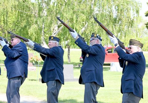 To honor those fallen service men and women, honor guards attended area cemeteries to pay their respects through firing a volley and playing of taps Memorial Day. Here, American Legion members Tom Lewno, Paul Peterson, Doug Lynch and Ralph Oakland aim and fire at Webster Cemetery Soldiers Circle before heading into the Memorial Day program at the high school. Reporter &amp; Farmer | Amanda Dulitz