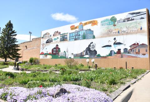 Reporter & Farmer | Timothy Gibson Spring has sprung and the Day County Arts Center Mural Garden on Webster’s Main Street is in full bloom, a perfect place to meander through vegetation in the sunshine while enjoying the work of the volunteer gardeners.