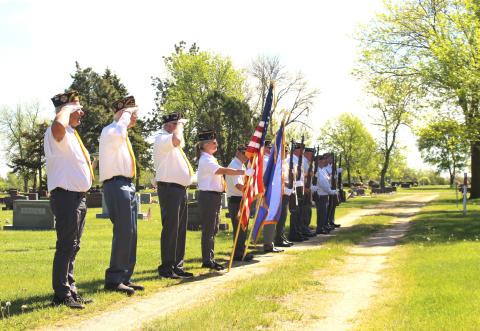 Veterans of Foreign Wars Post 4690 and American Legion Post 40 Honor Guard led by Commander Mike Wiley performs a ceremonial volley and taps at Soldier’s Circle, Saint Otto’s Cemetery, Webster, to honor our troops who made the ultimate sacrifice. Pictured from left are Robert Duerre, Floyd Hansmeier, Doug Lynch, Brenda Larson, Randy Gaikowski, Josh Anderson, Doug Van Houdt, Garry Fossum, Ed Damrau, Mike Wiley, Dennis Kurkowski and Tom Lewno. Reporter &amp; Farmer | Timothy Gibson