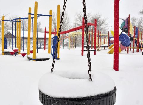 Webster Area School playground was devoid of any activity outside of collecting snowfall April 2 after two days of blizzarding occured. This storm represented 50 percent of Webster Area School’s snow days for the school year, according to superintendent Jim Block. Reporter &amp; Farmer | Jessica Washenberger