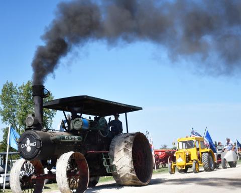 In Andover Sept. 6-8 the James Valley Threshing Show celebrated its 50th anniversary. On Sept. 7, the parade saw a wide range of antique vehicles ranging from trucks, cars and vintage tractors. Here, an antique Case tractor rolls coal to create a dramatic effect for the parade viewers. Reporter &amp; Farmer | Brenner Cariveau