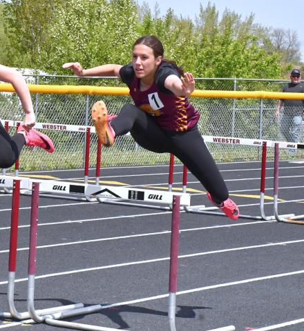 Emily Acree races in the 100m hurdles at the Webster Invitational May 21. Acree placed third with a time of 19.55. Reporter &amp; Farmer | Connor Handrahan