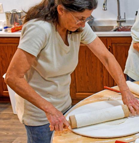 Terry Hagen rolls out lefse dough Nov. 21 during lefse fundraiser at Tabor Church, Webster. The dough must be thin enough so it can evenly cook on both sides, but sturdy enough to not fall apart. Reporter &amp; Farmer | Connor Handrahan