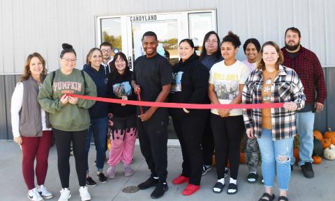 Candyland Smoke Shop officially cut the ribbon for their business Oct. 4. Present at the ribbon cutting were Candyland staff and members from Webster Area Chamber of Commerce. Pictured from left, Kathy Kwasniewski, Tammy Eidahl, Jami Hubsch, Kaylob Alston, Megan Traylor, Jessie Scott Sr., Bridgette Neilan, Roberta Neilan, Kailesha Neilan, Casharie Neilan, Julie Spiering and Curtis Neilan.