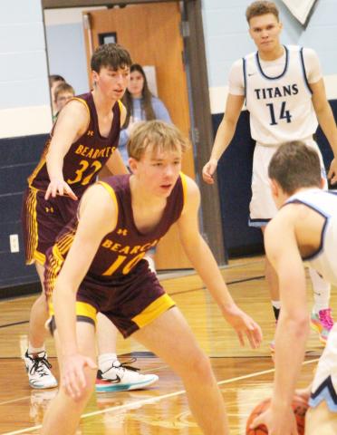 Bearcats traveled to face Leola/Frederick Area Titans Feb. 15 which ended in a 42-70 Webster Area loss. Here, Sheldon Schmieg (10) watches a Titan player closely while his teammate Gage Wik (32) guards Lucas Gulbranson (14) near the paint. Reporter &amp; Farmer | Subscriber Snapshot