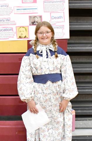 Rylee Curran portrayed Mary Ingalls May 1 at the armory during the Webster Area fifth grade students’ annual living wax museum. Fifth grade teacher Vanessa Bloom said of the event, “Students are given the option to do an individual person (who) has made an impact on American history, born in the U.S. They also have a choice to do an American event and work with a group up to three people representing three different perspectives of the event.” Reporter &amp; Farmer | Jessica Washenberger