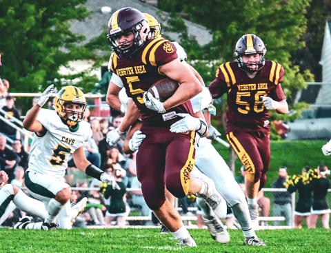 Webster Area running back Gage Baumgarn shrugs off a tackle during the Bearcat’s 32-26 win over Aberdeen Roncalli Sept. 26 in Webster. Baumgarn finished with 31 carries for 203 yards and two touchdowns. Reporter &amp; Farmer | Leyton Beardslee
