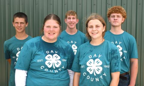 Small animal round robin participants at the Day County Fair Aug. 9 were, from left, Knute Hemmingson, grand champion Kelsey Fischer, Gabriel Gaikowski, Makayla Meland and Delaney Atherton. The 4-Hers took turns showing at five different stations, each centering on showcasing the youths’ skills in handling different spieces. Reporter &amp; Farmer | Amanda Dulitz