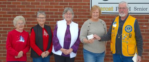 Lions donate to food pantry