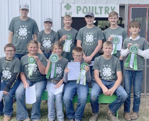 Participants in the Day County Fair 4-H poultry show are from left, front, Parker Zirbel, Aliyah Zirbel, Kallie Zirbel, Collin Zirbel, Aiden Gaikowski; back, Blaise McGregor, Macee McGregor, Gabriel Gaikowski, Caleb Gaikowski, overall grand champion Trey Dunse and overall reserve champion James Schulz. Reporter &amp; Farmer | Subscriber snapshot