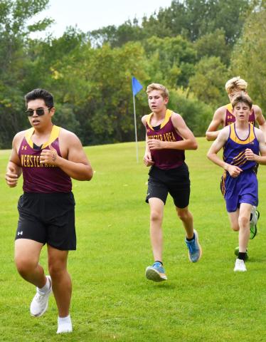 Webster Area Beacats hosted their first home cross country meet of the season at Webster Golf Course Sept. 17. Here, Bearcat runner Justin Ponce leads the pack with fellow Bearcats Gabriel Gaikowski and just behind him is Alec Garrett. Reporter &amp; Farmer | Brenner Cariveau