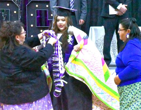 Waubay School held their graduation May 9 and honored the nine seniors who have finished high school. From left, Jo Roberts and Roxanne Roberts celebrate Jorie Robert’s graduation and honor her with gifts. Reporter &amp; Farmer | Connor Handrahan