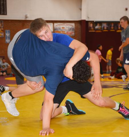 Bearcat grappler Chase Gregerson works a move on Jones County wrestler Bayden Raymond at the Thorn wrestling camp which took place June 9-11 at the Webster Armory. Reporter &amp; Farmer | Annie Witt