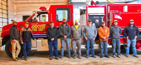 Andover Fire Department recieved a $5,000 grant from South Bow Jan. 6. From left, Cory Schuring, Scott Schuring, Bill Lamee, Jesse Morehouse, Alex May, Chris Barse, Chad Furney, Caleb Furney and Bryce Raap plan to use the grant money to help update equipment and keep the community safe. Reporter &amp; Farmer | Connor Handrahan