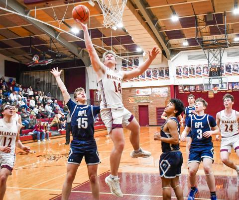 Matthew Mount (14) of Webster Area drives to the basket during the Bearcats 57-38 victory over Great Plains Lutheran Panthers Feb. 3 in Webster. The win brought Webster to a 6-6 record on the season. Reporter &amp; Farmer | Connor Handrahan