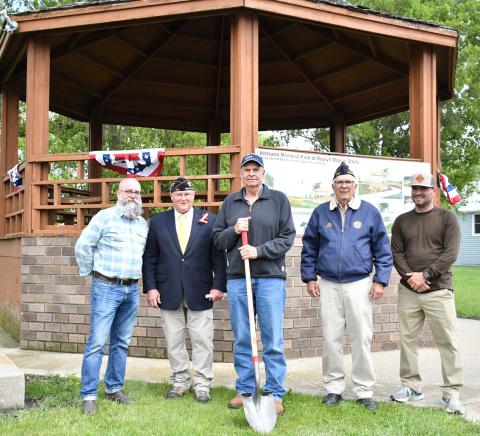 A ground breaking ceremony was held for the new Roslyn Area Veterans Memorial Park May 27. Pictured from left are park designer Rollie Eihdahl, Roslyn American Legion Commander Terry Corner, Roslyn Town Council President Tom Lee, Grenville American Legion Commander Dennis Lewandowski and veteran Levi Jensen. See page 16 for a digital rendering of the future memorial. Reporter &amp; Farmer | Luke Caputo