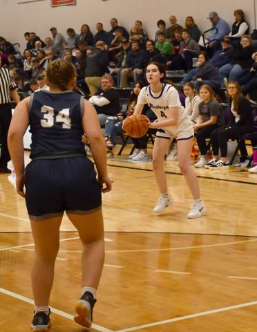 Waubay-Summit girls basketball hosted Great Plains Lutheran Feb. 20 in Summit which ended in an 18-55 loss for the Mustangs. Here, Regan Schmidt (4) gears up to take a three as a Great Plains Lutheran defender guards the interior. Reporter &amp; Farmer | Brenner Cariveau