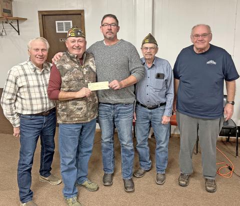 Members of VFW Post 4690 in Webster made a donation to Webster Theatre in order to bring the showing of a free kids movie for area children. The check donation, in the amount of $1,000, was presented Dec. 10. Pictured from left are VFW member Dennis Kurkowski, VFW Commander Kevin Bohn, Webster Theatre owner Shawn Rithmiller, VFW members Wayne Anderson and Tom Lewno. Reporter &amp; Farmer | Subscriber snapshot