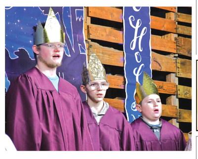 From left, Ari Sichmeller, Jack Okroi, and Bryson Bloom represent the wise men and sang during a live reenactment of the holy night Dec. 21. The wise men came to visit Jesus after his birth and brought him presents.