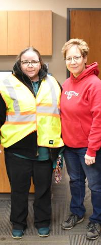 After seeing crossing guard Annette Duarte stand in the cold without a jacket, an anonymous citizen went to Ace Hardware and purchased a jacket on her behalf and requested owner Shannon Garduno to give her the jacket. Here from left, Duarte stands with her new coat next to Garduno. Reporter &amp; Farmer | Brenner Cariveau
