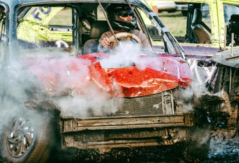 Aaron Toupal of Kimball sustains a hit during the demolition derby at the Day County Fair Aug. 9. Toupal came in second in the minivan category which saw four entries. Reporter &amp; Farmer | Leyton Beardslee