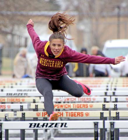 Emily Acree clears a hurdle at the Tiger Relay meet in Ipswich April 26. Reporter &amp; Farmer | Subscriber snapshot
