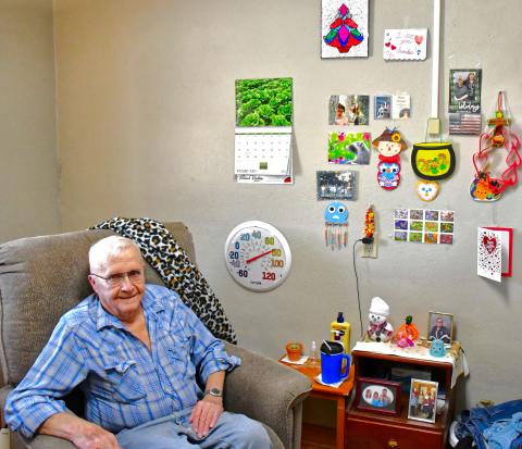 90-year-old Sonny Larson is a Day County resident currently living at Strand-Kjorsvig Living Center. Larson has a wall full of his arts and crafts and pictures of his family. He said he and his daughter call at least once a week to check in on each other. “As long as I can hear her voice” said Larson. Reporter &amp; Farmer | Connor Handrahan