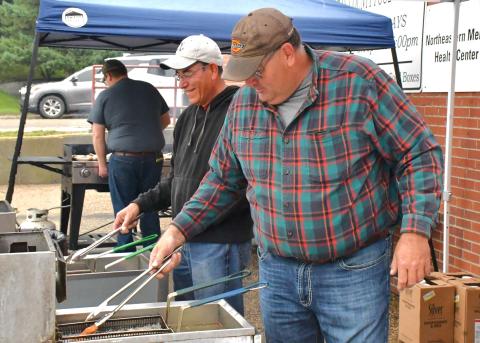 A German dinner was provided for attending community members at the annual German Fest Sept. 26. From left, Alfredo Garduno and Nathan Fischer help fry the schnitzel for the meal. Reporter &amp; Farmer | Connor Handrahan