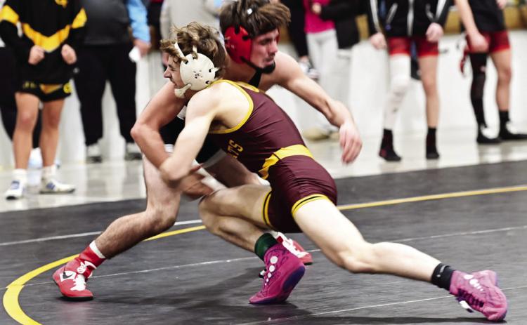 Webster Area wrestlers competed at the MVPCS Invitational in Plankinton Dec. 21. Here, Webster Area wrestler Haeden Jorgenson competes against Gavin Braun from Kimball/White Lake/Platte-Geddes in the first place match for the 138 pound weight class. Reporter &amp; Farmer | Dax Jorgenson