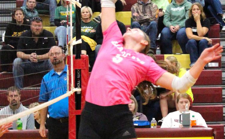 Webster Area setter Chloe Mammenga bumps a short shot over the net for a point against Northwestern Oct. 1 Reporter &amp; Farmer | Timothy Gibson
