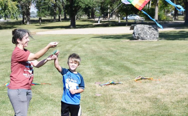 As the annual Fort Sisseton Harvest Festival took place Sept. 21, kite flying was one of the activities offered for attendees to partake in. Pictured on the right are six year-old Britton resident Rowan Armour with his mother Tara Arntsen flying one of the many available kites during the windy day. Reporter &amp; Farmer | Brenner Cariveau