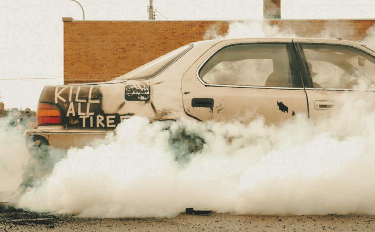 Mason Bock in his Lexus LS400 competes in a burnout contest at Pumpkin Fest in Webster Oct. 4. Bock, who is from Watertown, placed first in the competition. Reporter &amp; Farmer | Leyton Beardslee