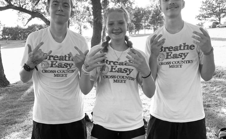 Webster Area varsity medal winners at Milbank Breathe Easy Invite are from left Grady Wagner, Hannah Sonstebo and Jase Voss. Wagner finished 10th in the boys race with 16:25.32, Sonstebo finished sixth among the girls in 18:18.77 and Voss finished ninth in the boys race in 16:18.24. Reporter &amp; Farmer | subscriber snapshot