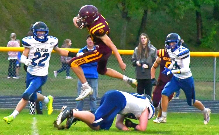 Webster Area Bearcats had their first win of the season against Florence/Henry for their homecoming game Sept. 25. Here, Hudson Lesnar catches an interception and jumps over a defender. Reporter &amp; Farmer | Connor Handrahan