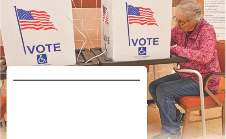 (Pictured) The Nov. 3 election is approaching and absentee voting is underway at Day County Courthouse, where local voter Diane Huggett cast her ballot Oct. 22. Reporter &amp; Farmer | Timothy Gibson